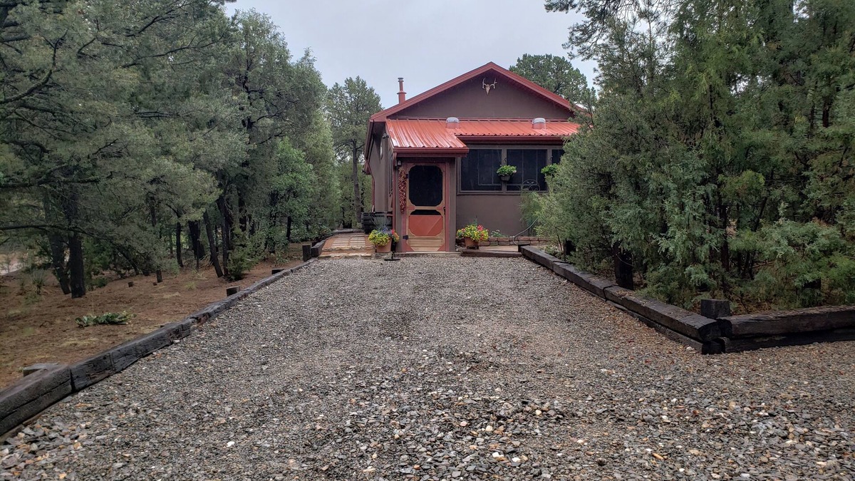 Tijeras House | Get away to the cool mountains and relax at the Cuddle Cottage! Double occupancy