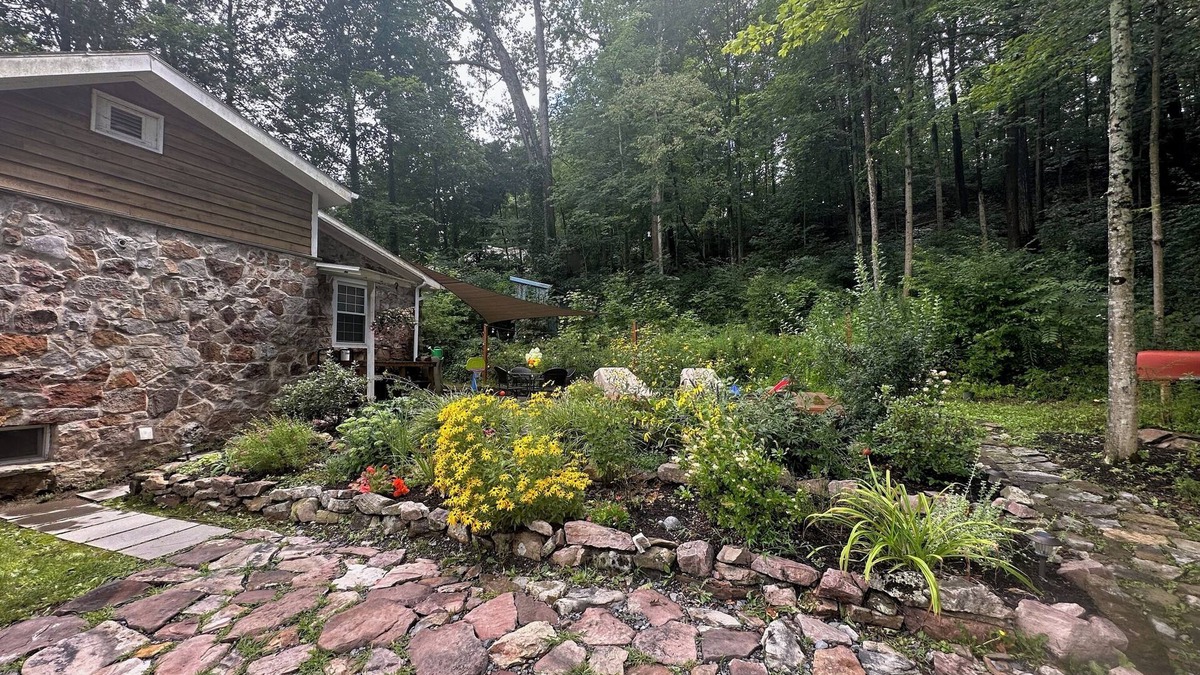 State College Cottage | Getaway on famous Spring Creek, minutes from Beaver Stadium and State College.