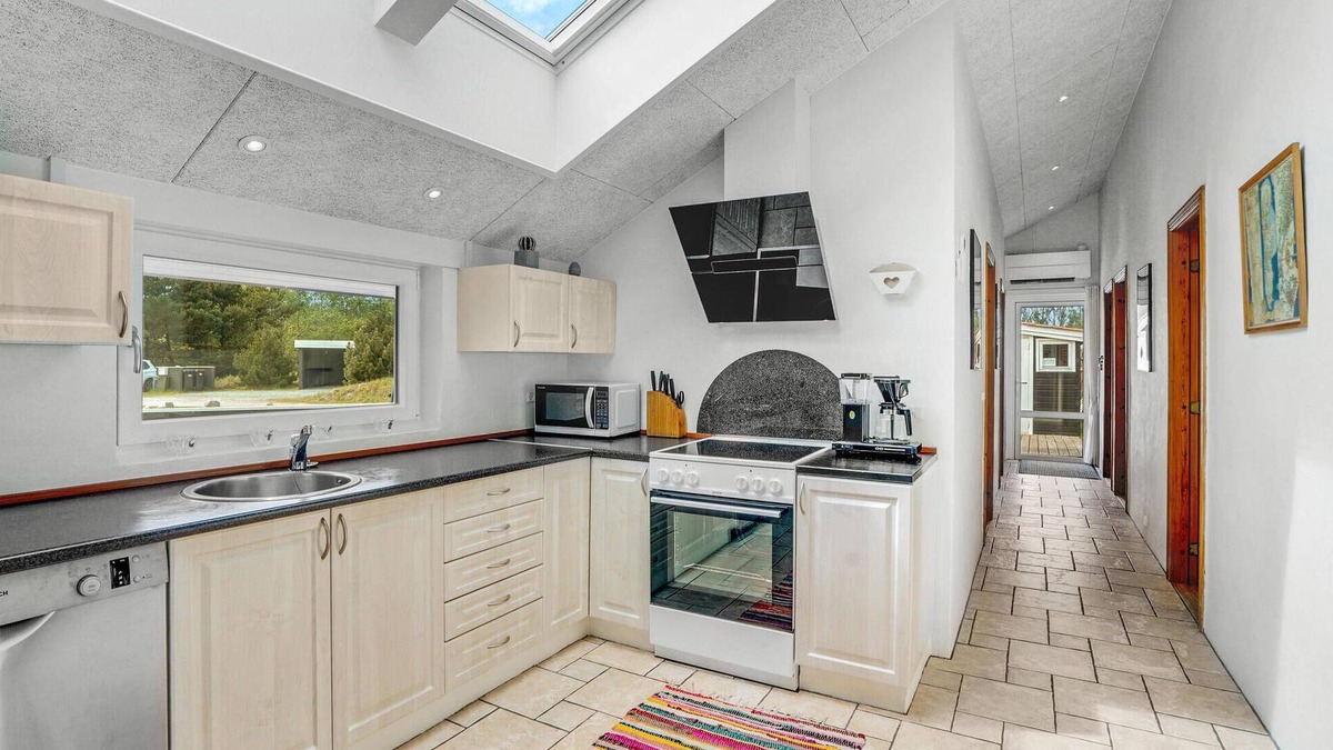 Rindby Strand House | Gigantic holiday home with swimming pool and large garden on the island of Fanø.