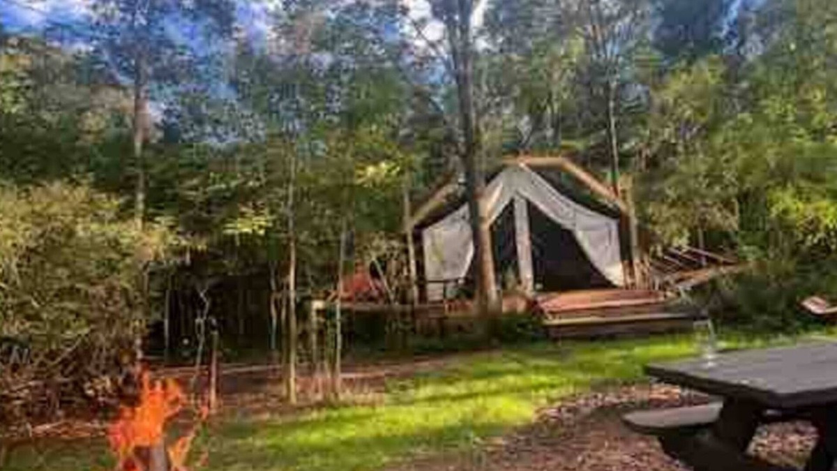 Trumansburg RV Rental | Glamping at CrowNestFarm! Private tent/Communal Bathroom. Dog Welcome