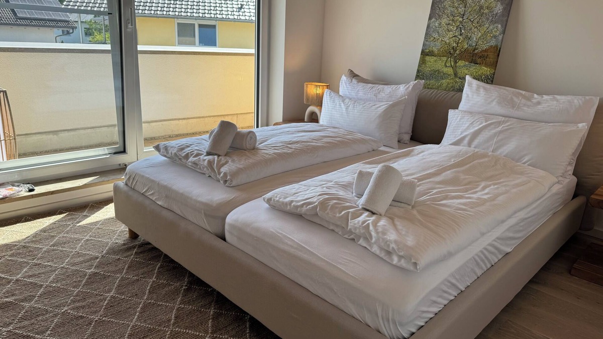Worthsee Apartment | ღLIBORIA Idyllic roof terrace apartment with a view of Lake Wörth