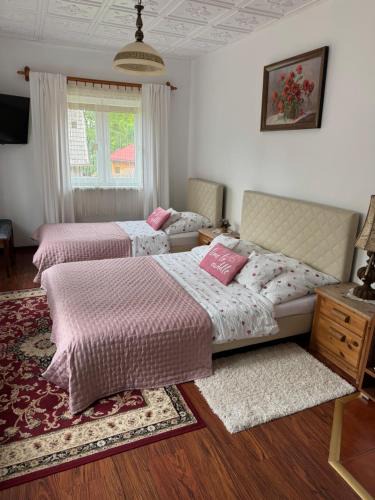 Inwald House | Gościniec Grek Zorba - pokoje i domki 4 osobowe - 16km od Zator Energylandia