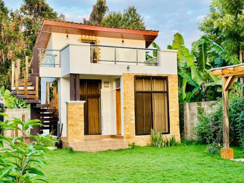 Nkoanrua Apartment | Golden hour tiny house