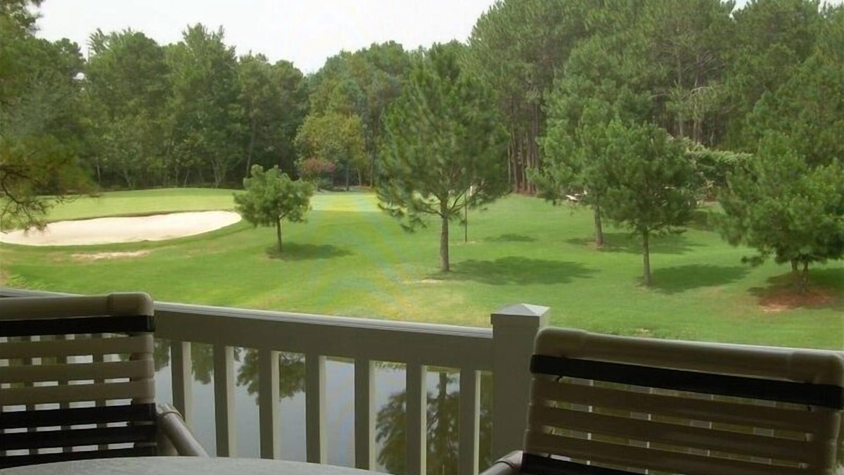 Sunset Beach Condo | GOLF COURSE CONDO - POND VIEWS & FREE NETFLIX