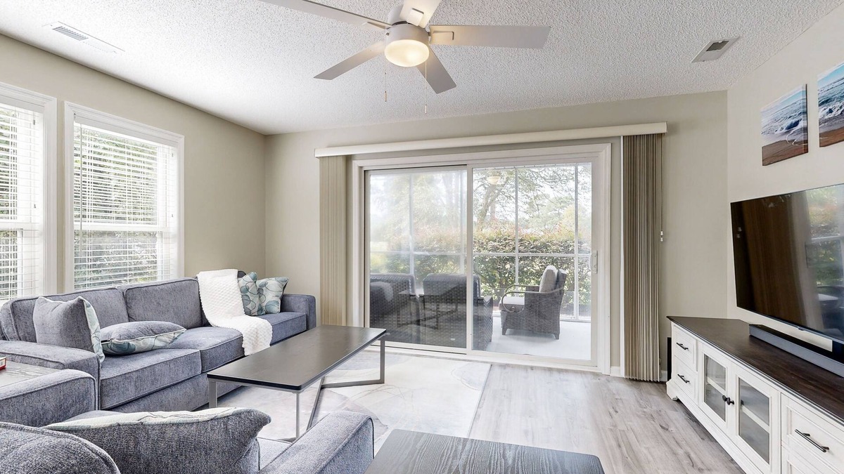 St. James Condo | Golf course view home with patio, close to ocean and beach access