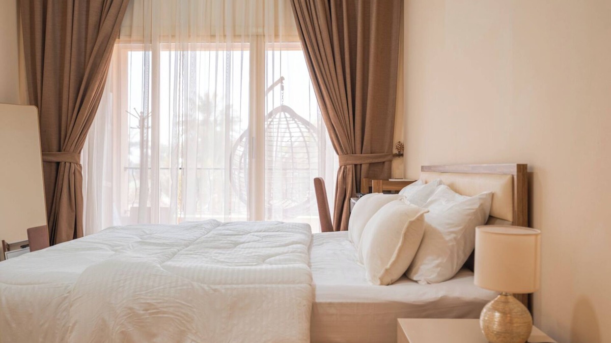 Al Hamra Village Apartment | Golfside Serenity: Stylish 1 BHK by FREE Holiday Homes