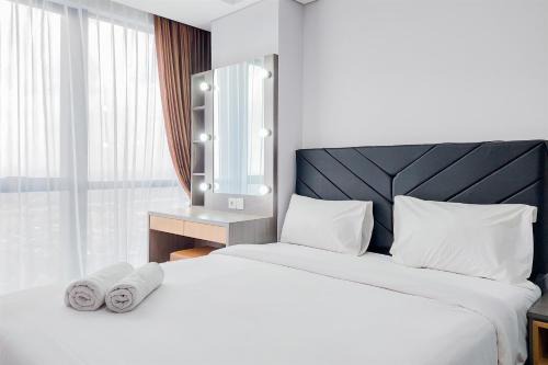 Pinang Apartment | Good and Restful 1BR at The Smith Alam Sutera Apartment By Travelio