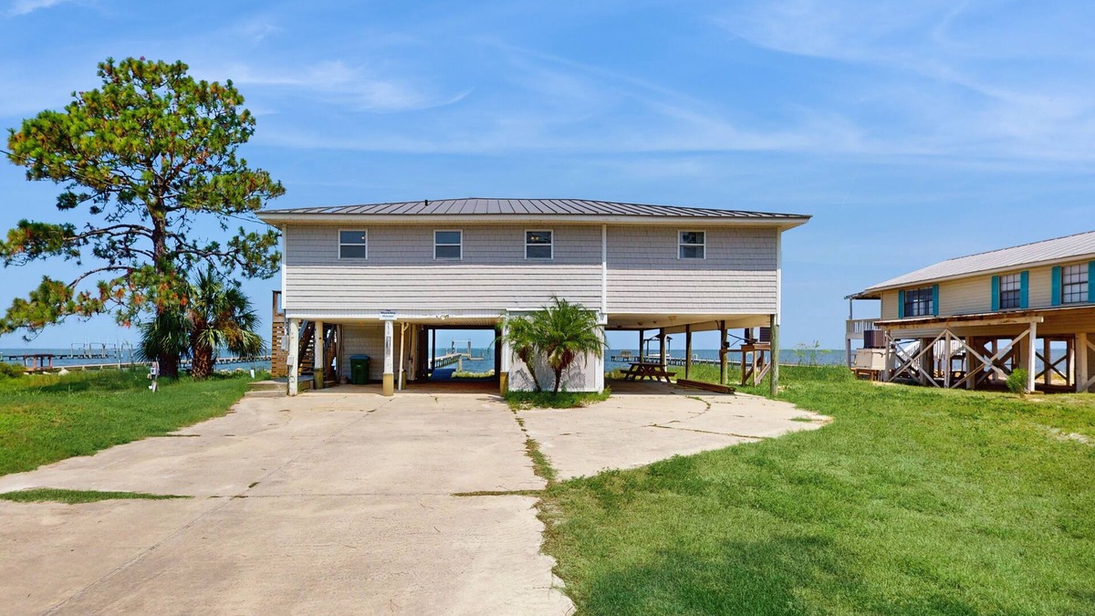 St. George Island House | Gorgeous bayfront home, Private dock, Gas grill, Wifi, Washer and dryer
