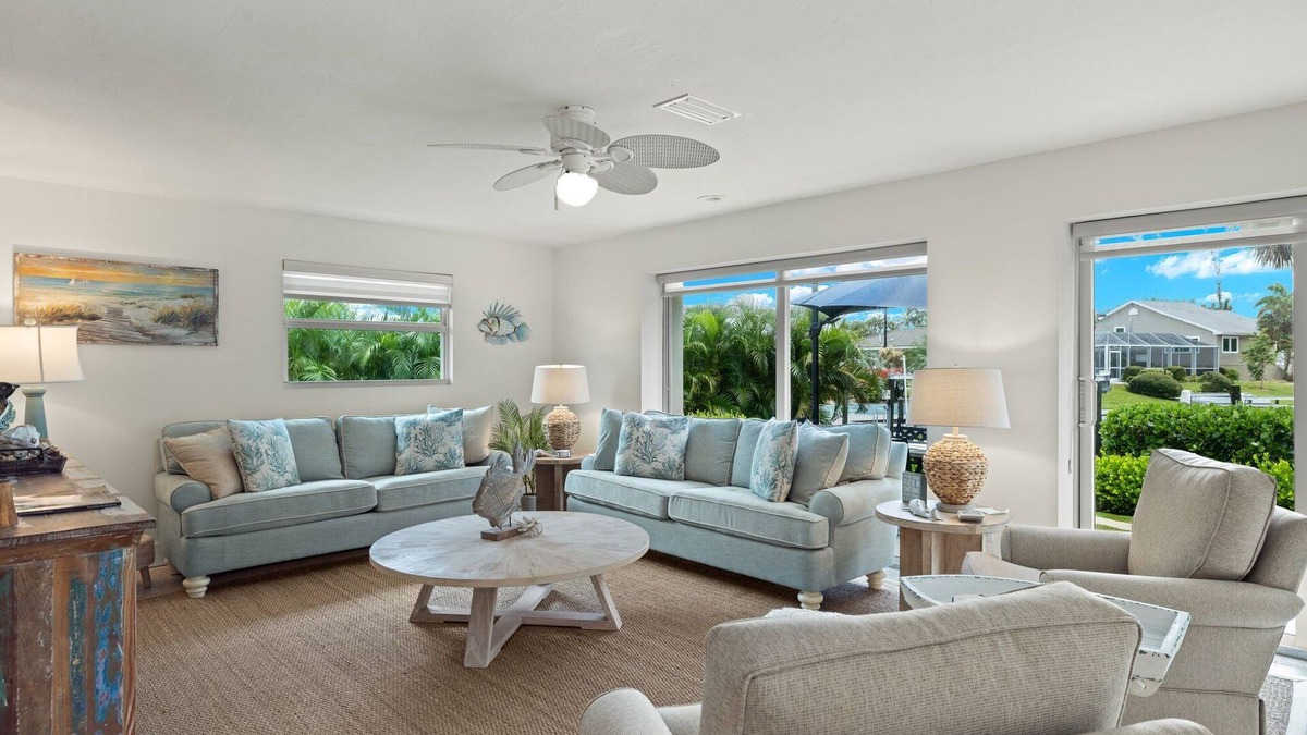 Shell Harbor House | Gorgeous canal front home walking distance to the beach!
