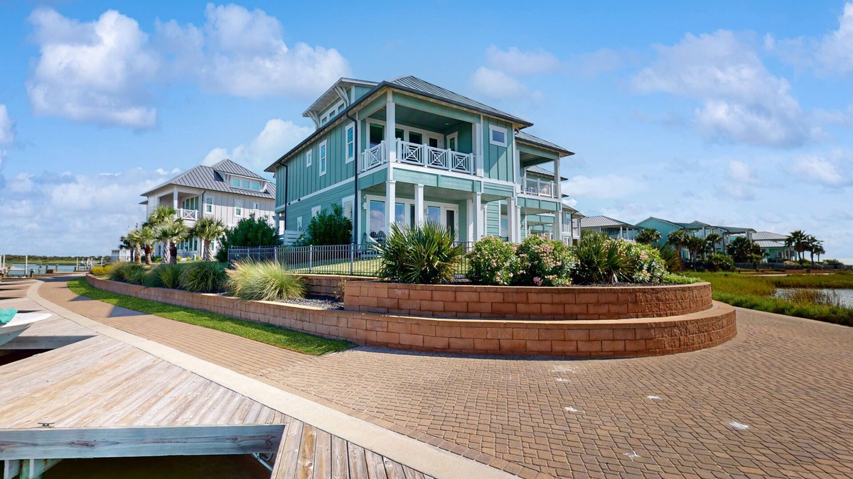 Rockport House | Gorgeous coastal townhome, private patio and shared pool