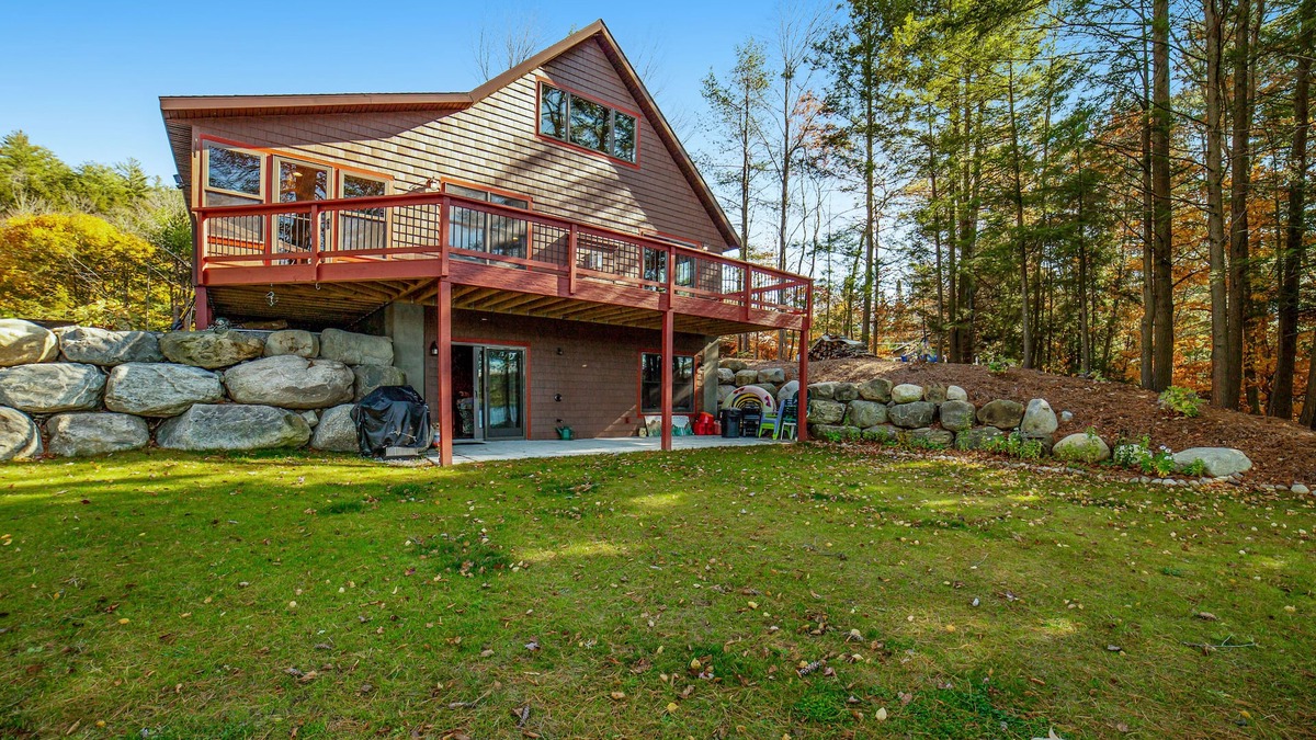 Chestertown House | Gorgeous Lakefront Home with a Fire Pit, Two Living Areas, and a Sunroom
