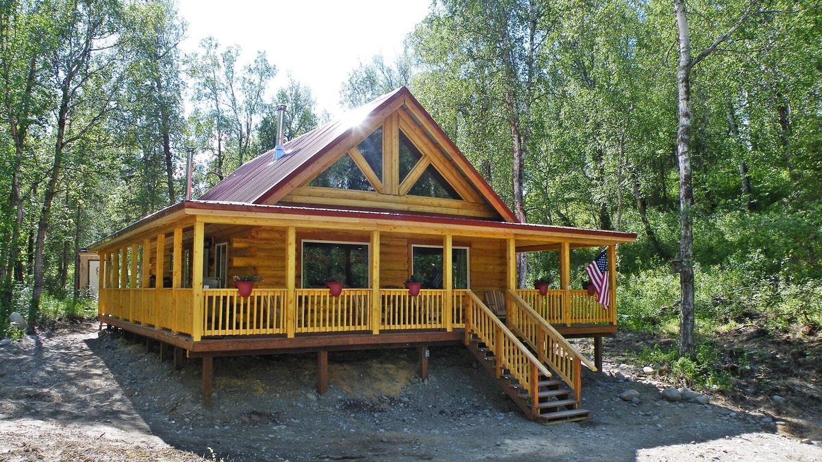 Sutton-Alpine Cabin | Gorgeous Log Cabin With Huge Wraparound Porch