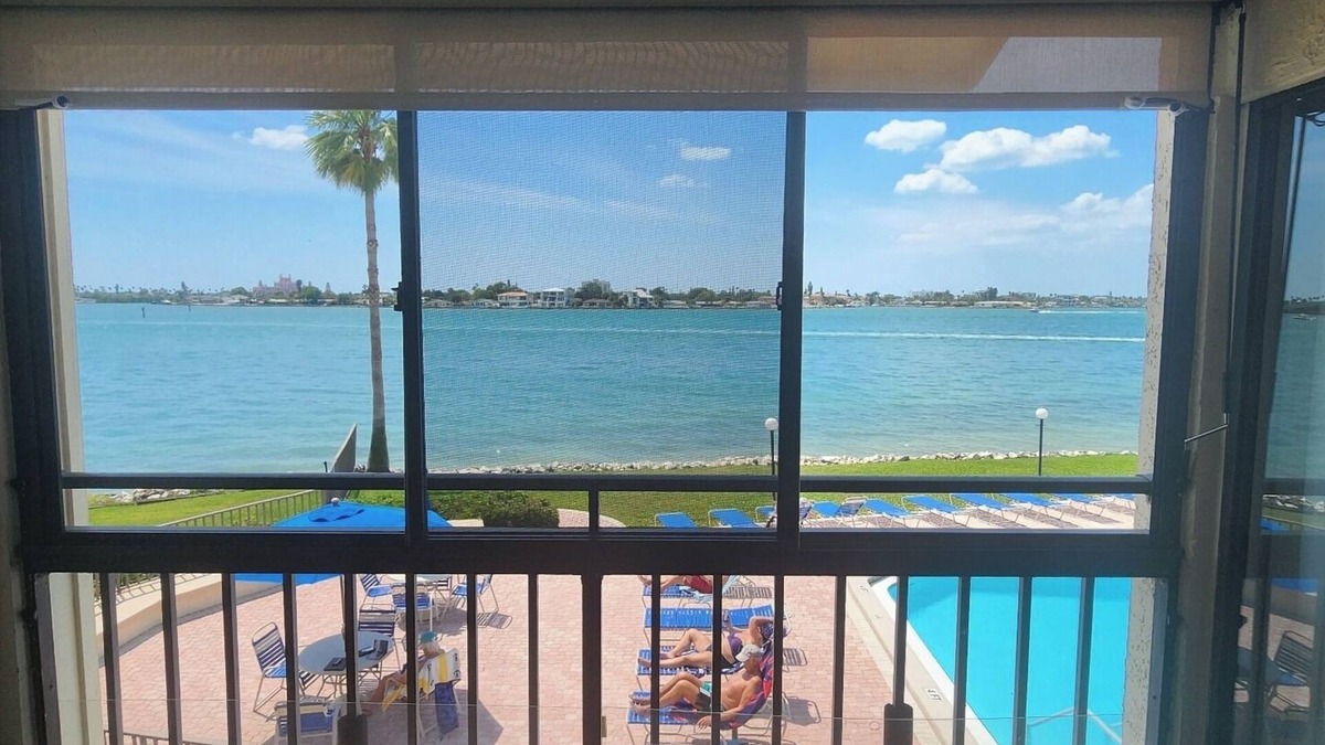 Casa del Mar Condo | Gorgeous Second Floor Waterfront Villa with Sunset views over Boca Ciega Bay!