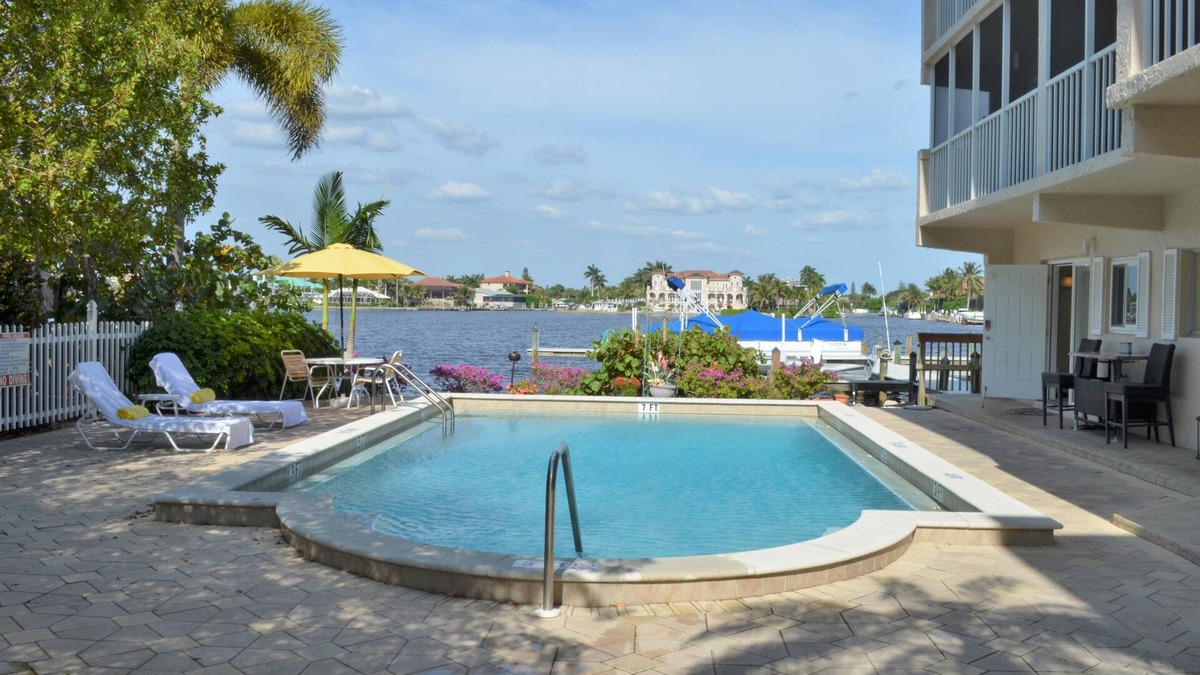Vanderbilt Beach Condo | Gorgeous Waterfront Property On Vanderbilt Bay. Beach Access Just Steps Away.