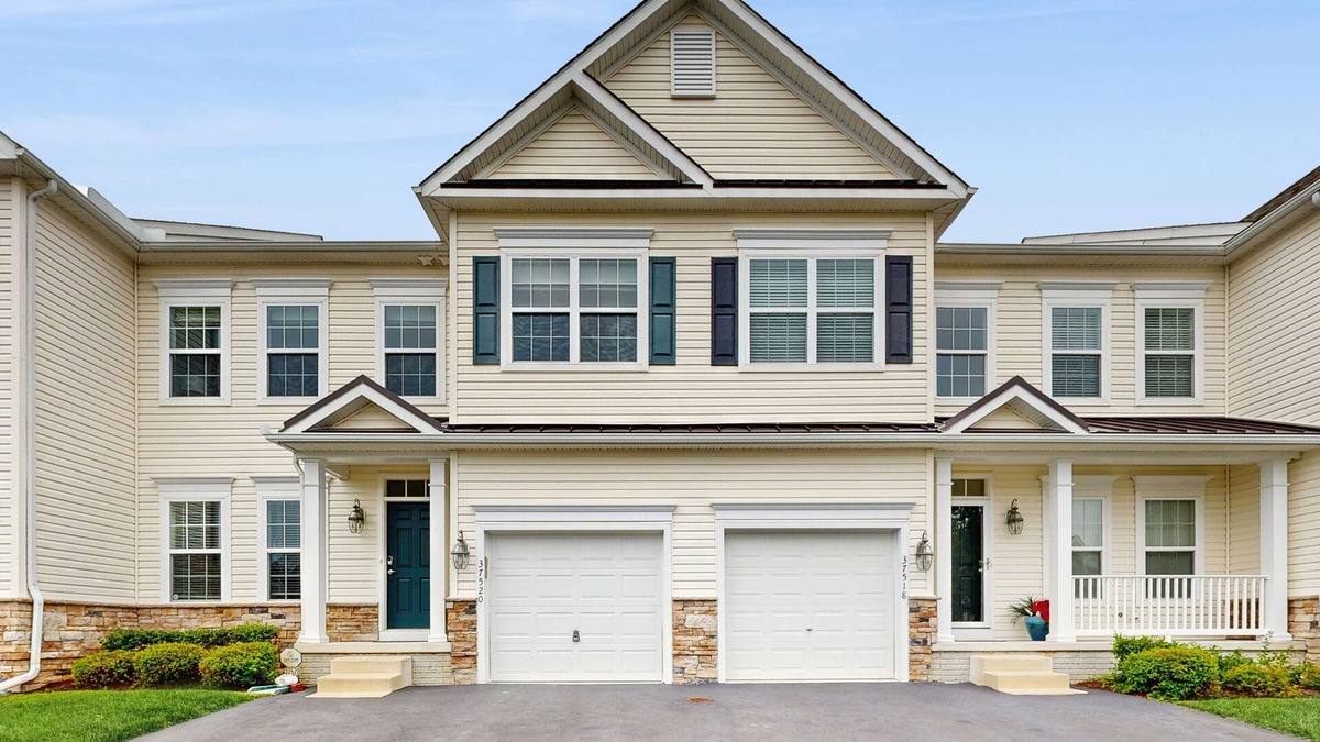 Rehoboth Beach House | Grande at Canal Pointe townhome with pools, sports courts, & gym