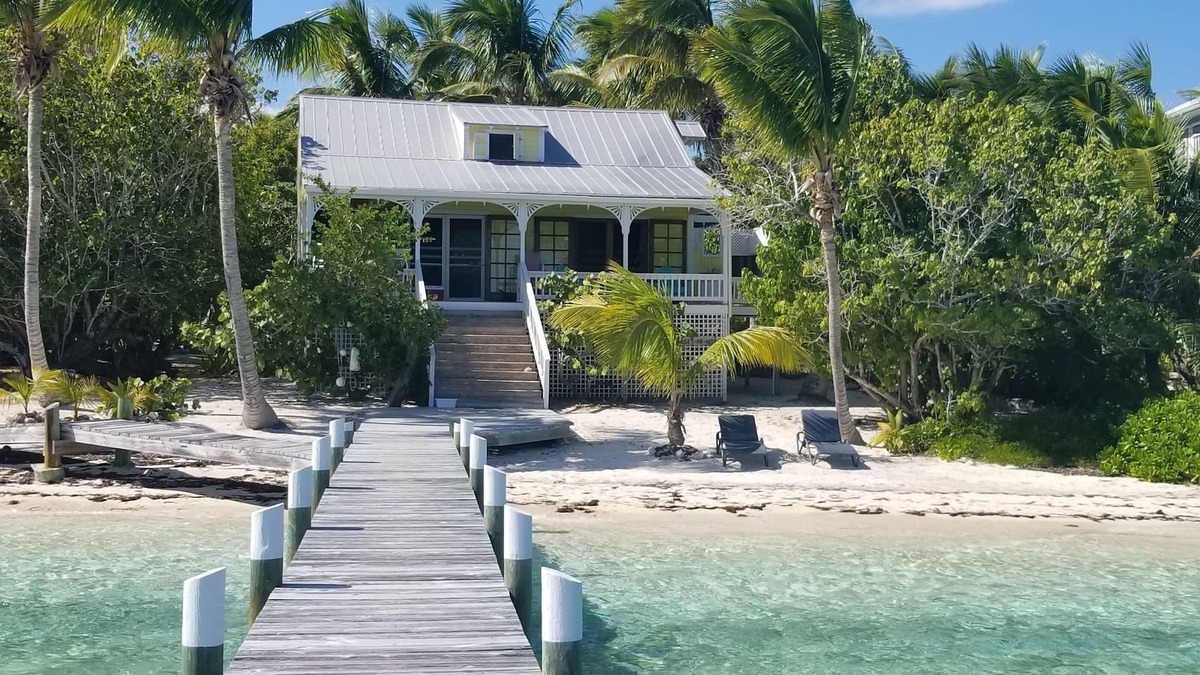 Lubbers Quarters Cay House | Green Bananas Cottage with sandy beach and private dock