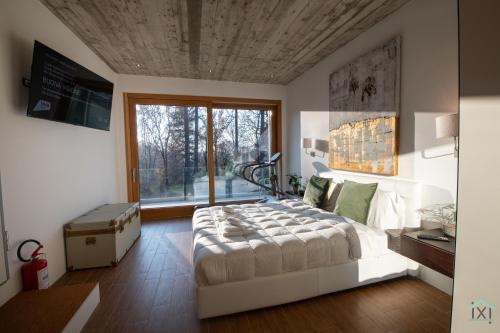 Marchirolo Apartment | Green forest - Ixihome