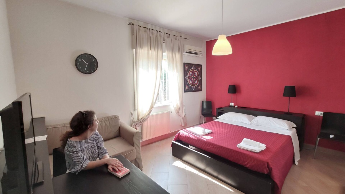 Aci Castello Apartment | Green Oasis Suite -A modern, cozy retreat in a lush setting perfect for couples.