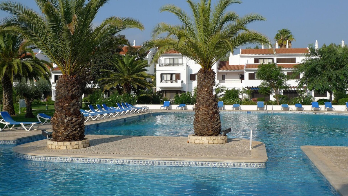 Almancil Apartment | Ground Floor Apartment in Lakeside Village overlooking lake, pool and gardens.