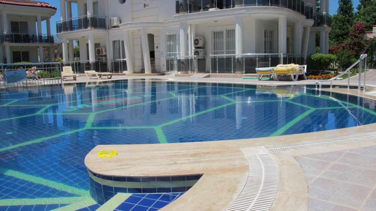 Fethiye City Center Apartment | Ground Floor Apartment on a private complex with gardens and swimming pool