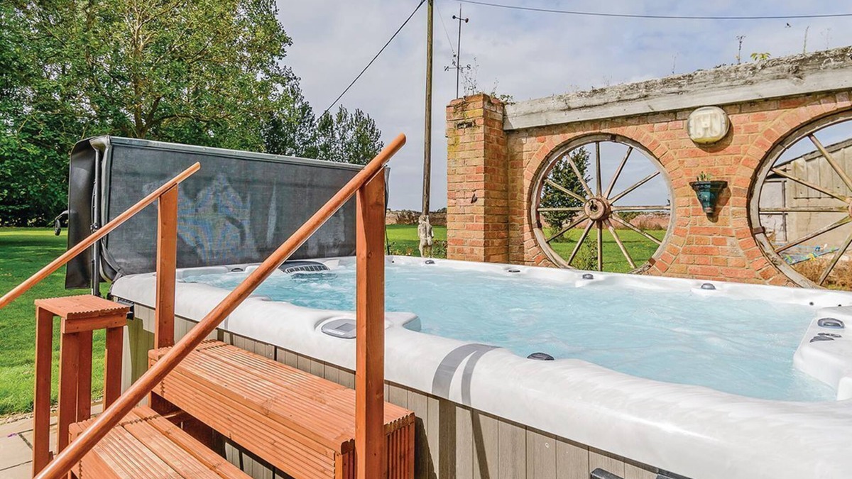 Wisbech Cottage | Ground floor: Three living areas, two with open fire, TV with Freeview/DVD.