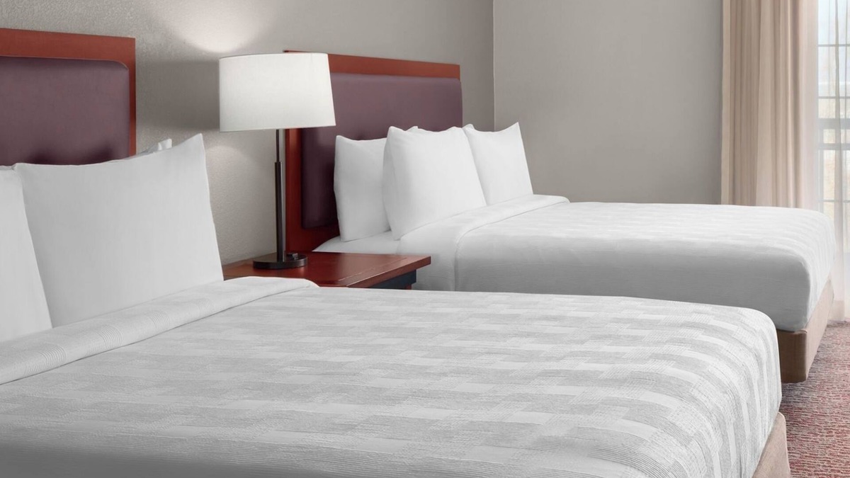 The East Side Hotel | Group Comfort – Homey Suite w/Kitchen, Living Area & Free Airport Shuttle