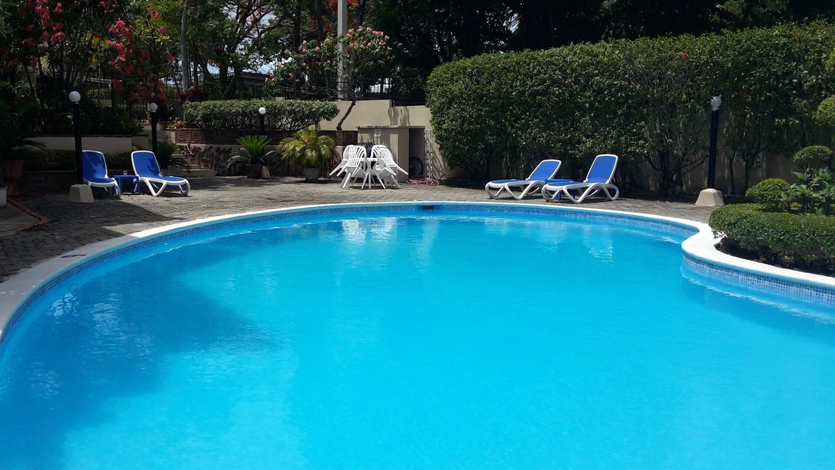 El Batey Apartment | Guest-friendly 2-BD central condo near beach, with pool, Wi-Fi, cable TV