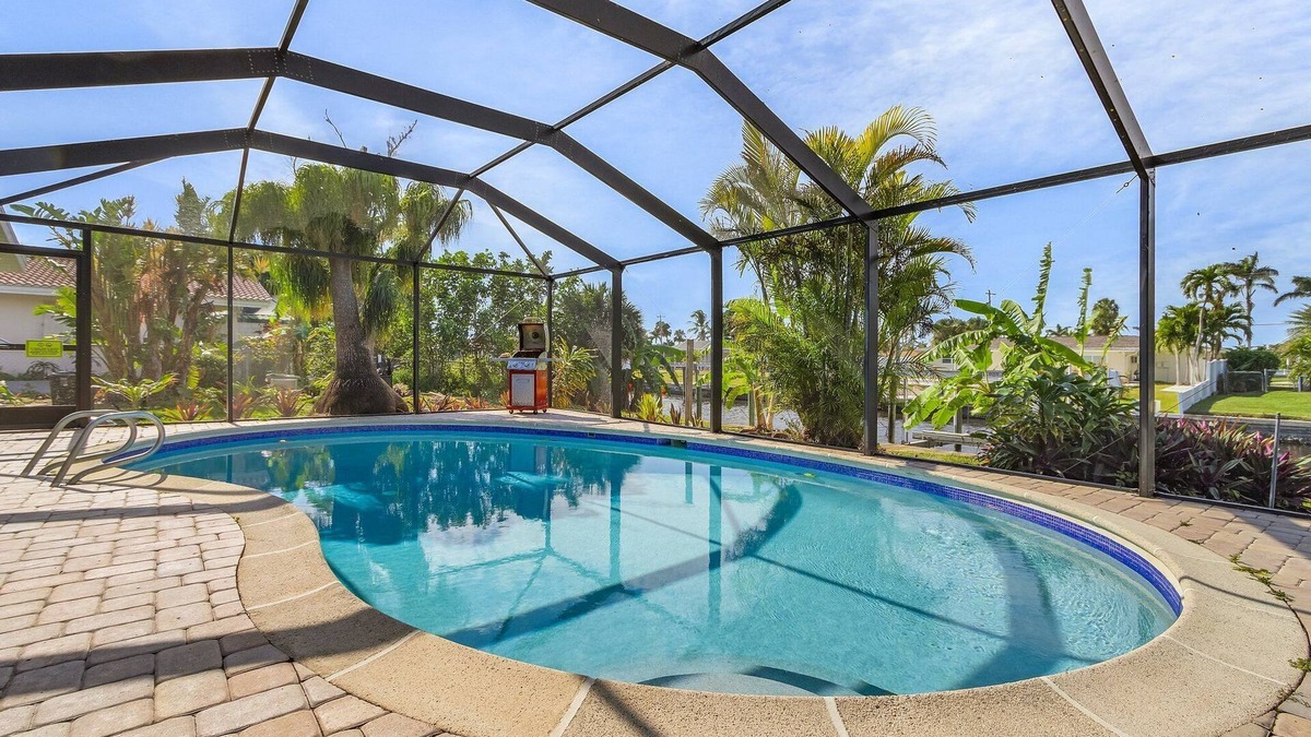 Eight Lakes House | Gulf Access, Heated Pool, Dock, Lanai – Sunset Coast Bungalow - Roelens