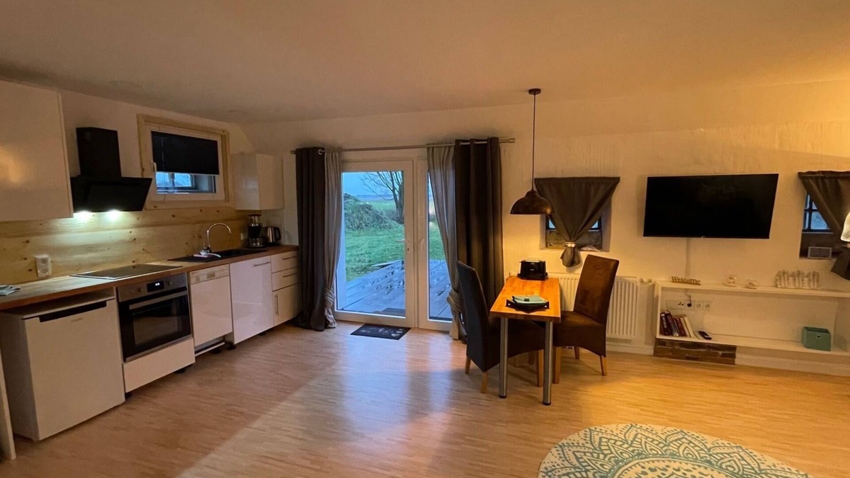 Grosefehn Apartment | Gulfhof Studio "Norderney" with a fantastic view of the nature reserve