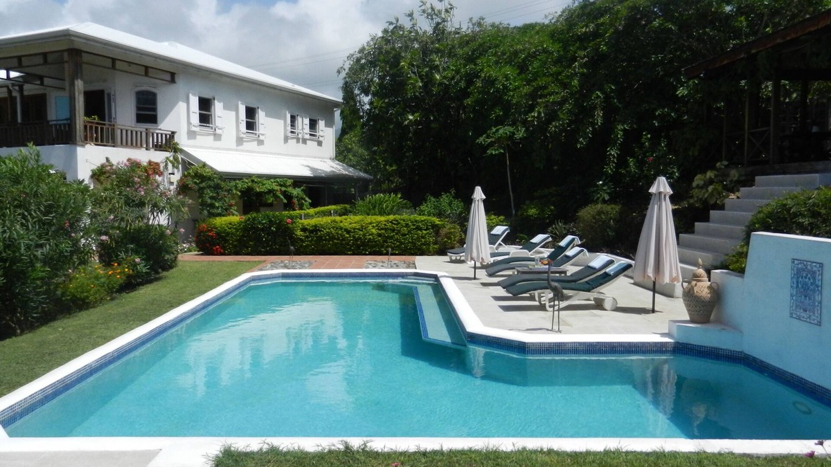 Saint David's Villa | Half Moon Villa :- A beautiful villa with a large pool & garden, ocean views.