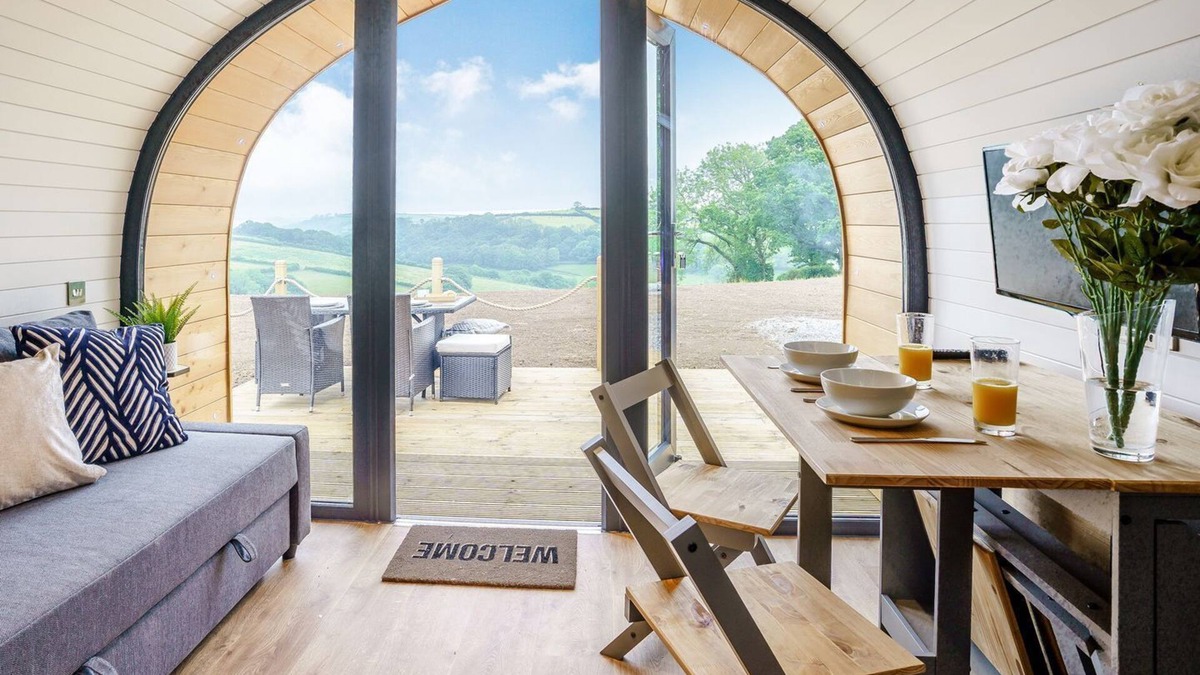 Whitland Cottage | Hand picked for its stunning countryside views and private Scandinavian log fired hot tub.