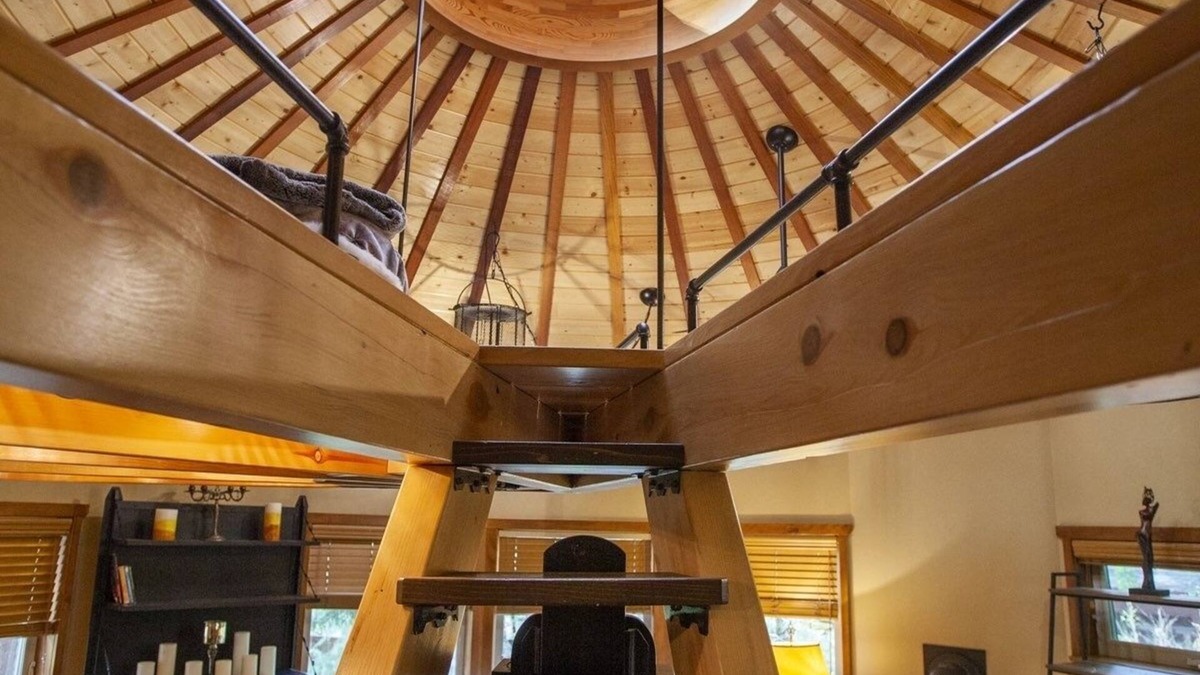Rough and Ready Apartment | Handcrafted Roundhouse studio & loft. Large sky window + private outdoor shower