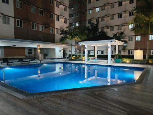 Trece Martires Apartment | Happy Stays C - The Queen's Loft at SMDC Hope Residences