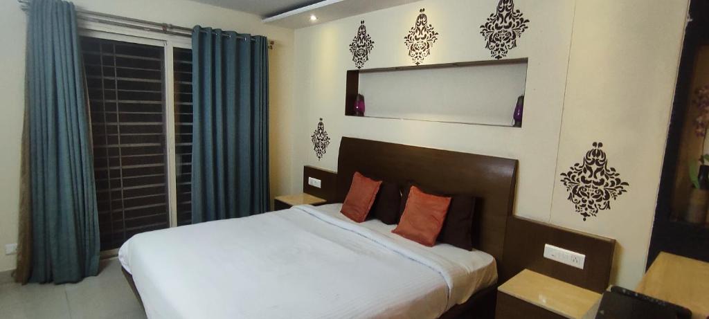 Gokulam Apartment | Happy Vibes studio flats - service apartment