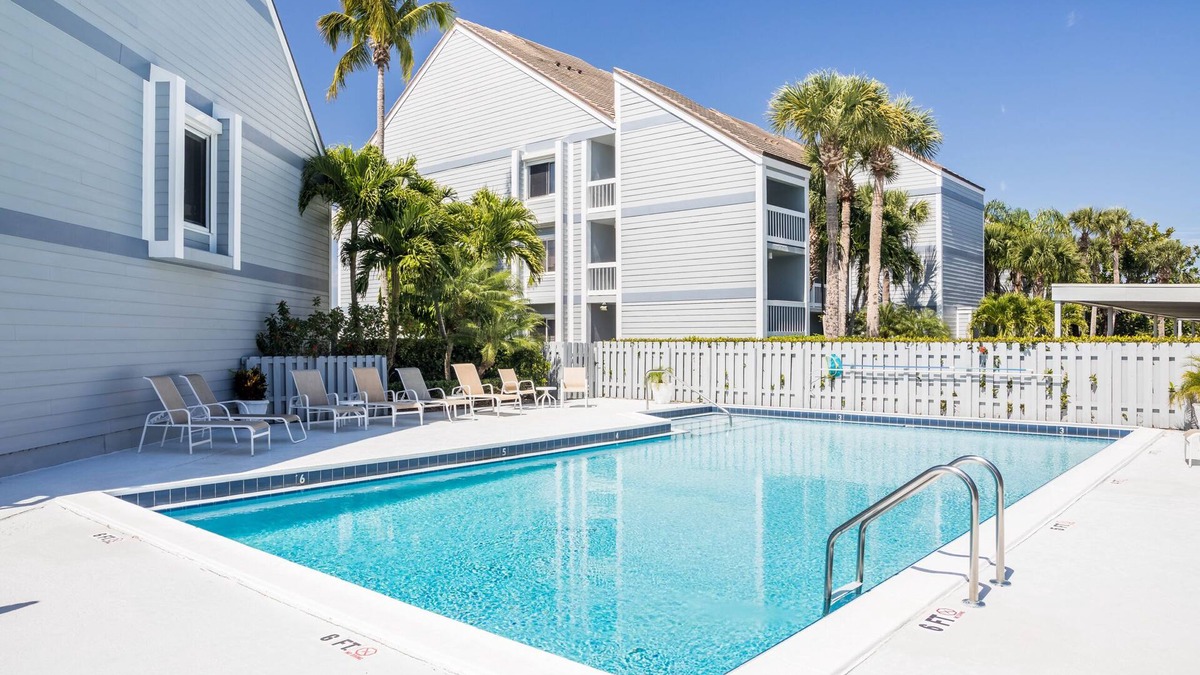 Moorings Condo | Harbor view, sunsets and a short walk to private beach access, we have it all!