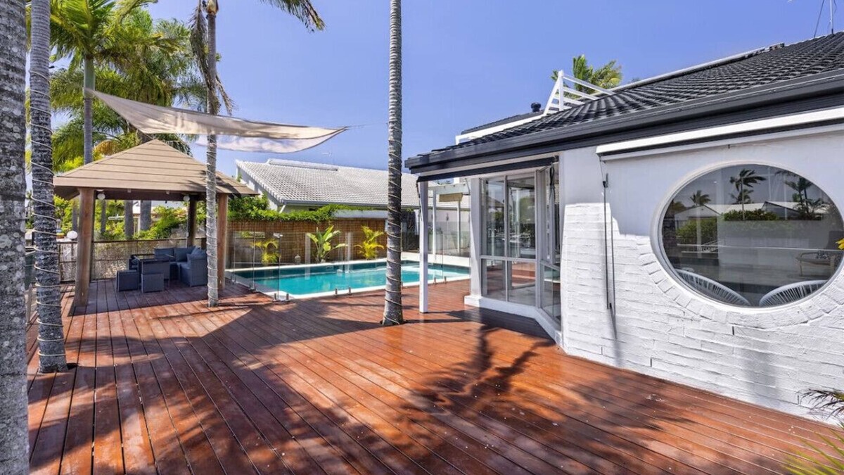 Runaway Bay House | Harborview Bliss: 4BR Coastal Retreat w/Pool