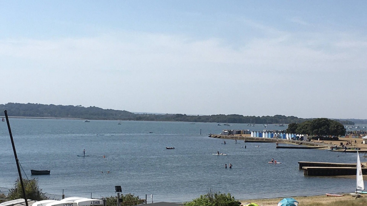 Hamworthy Apartment | Harbour Lights sea and beach views with a Caribbean-style and secure parking