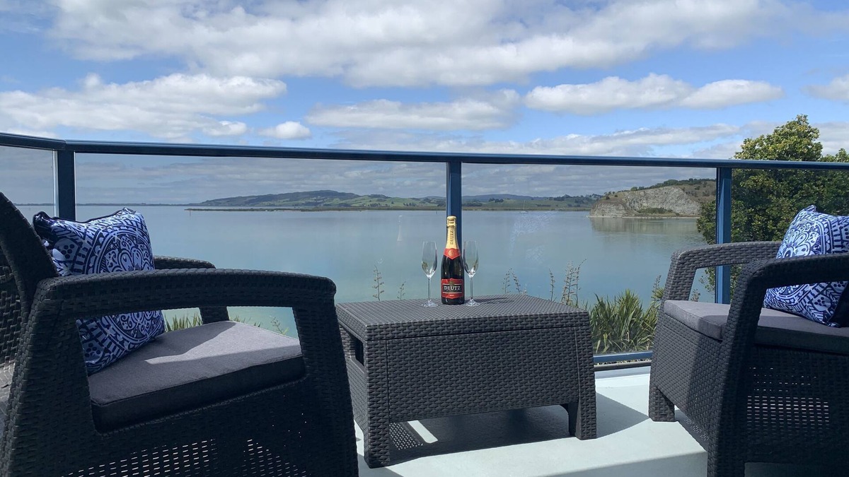 Onerahi Apartment | Harbour views from super spacious upstairs apartment. Fully equipped.