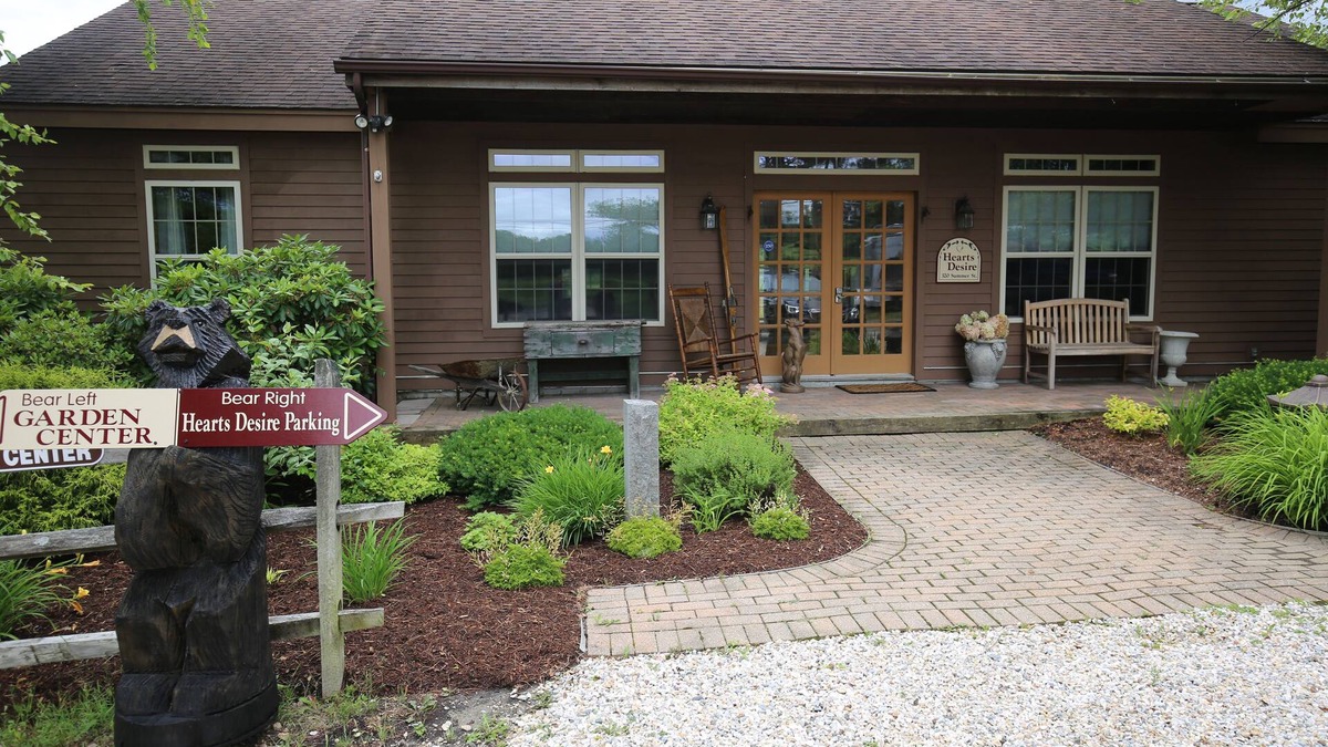 Lanesborough House | Hearts Desire is a furnished whole house in a small, colorful garden center.