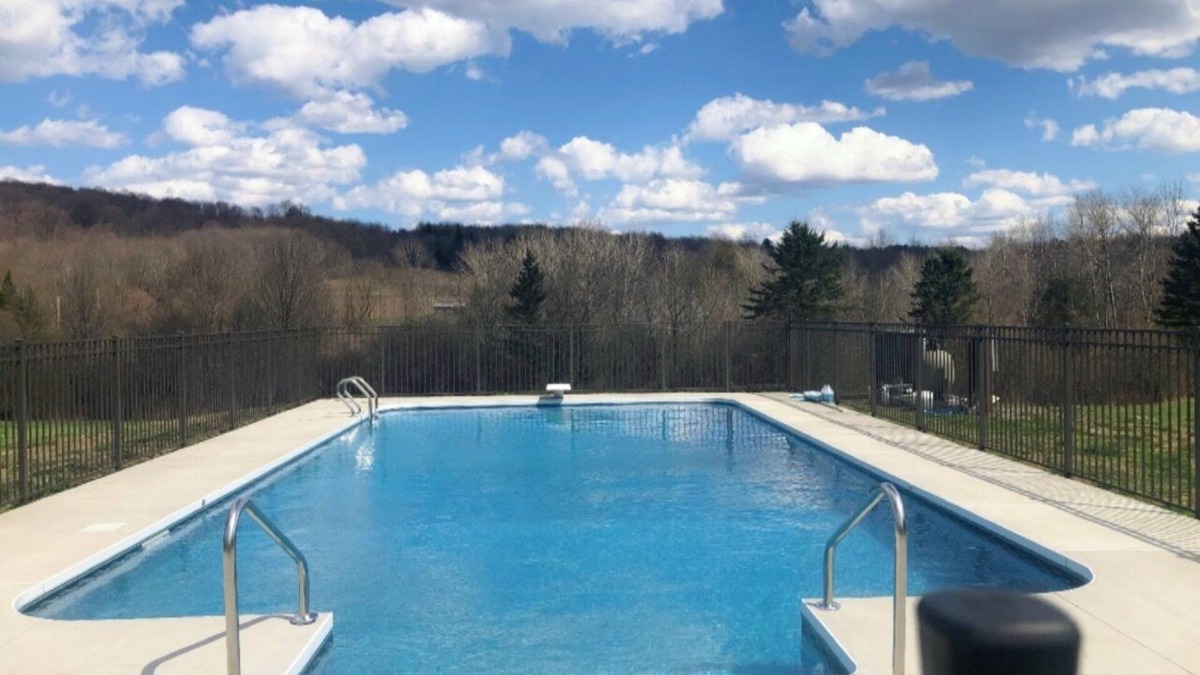 West Winfield House | HEATED POOL! 4 Bed/3 Bath home on 30 acres with pond and trails!