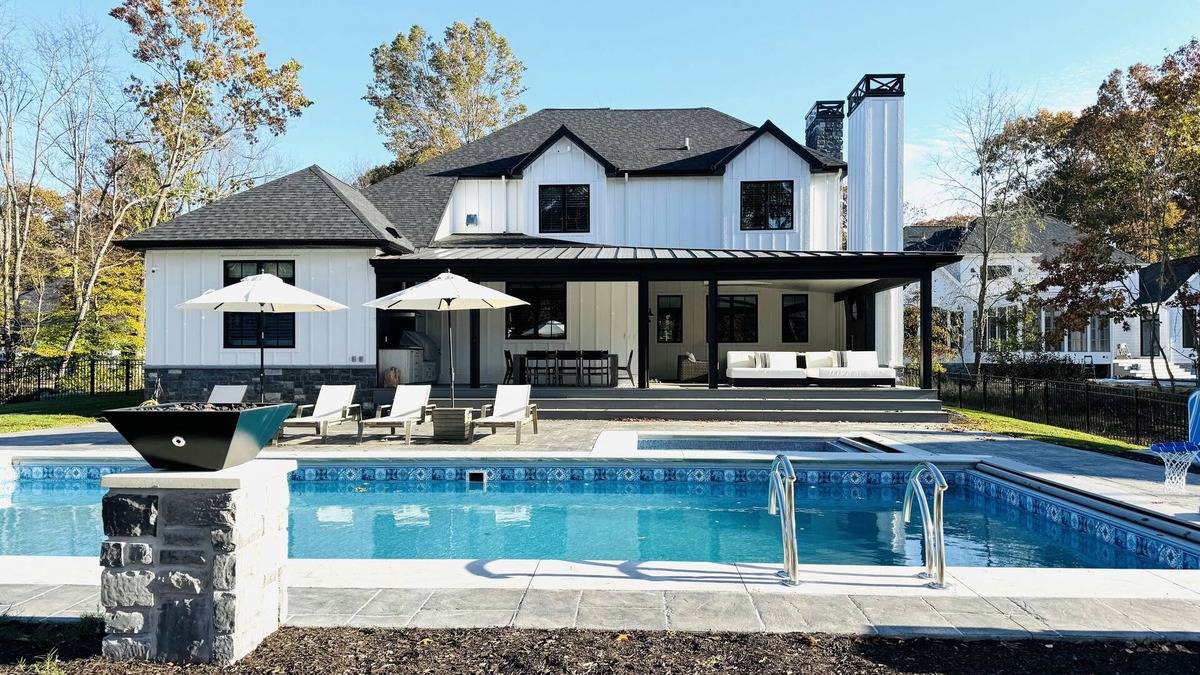Grand Beach House | Heated pool, porch w/fireplace, close to beach & park, 6 per golf cart included