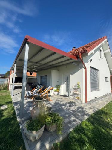 Videm House | Hiška pri brajdah
