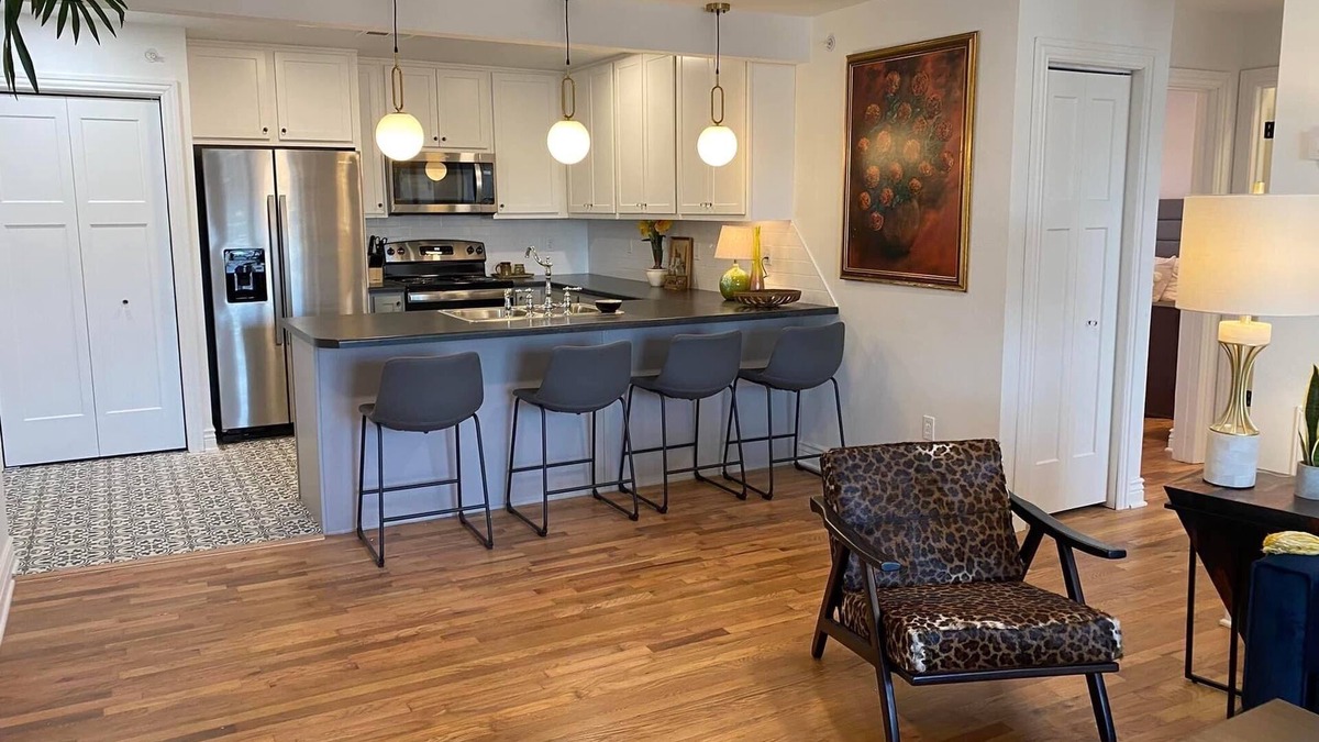 Woodward Apartment | Historic 100+ year old restored 6 unit fully furnished apartment building.