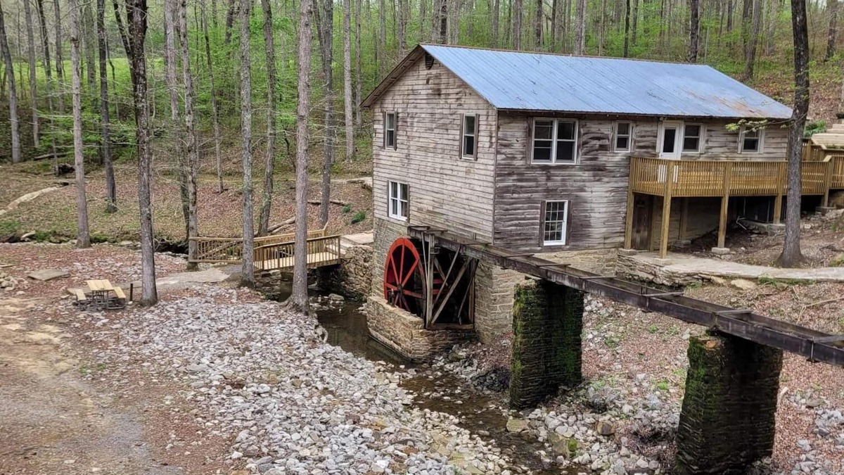 Cullman Cabin | Historic Cabin in a natural setting with waterfalls and covered bridge