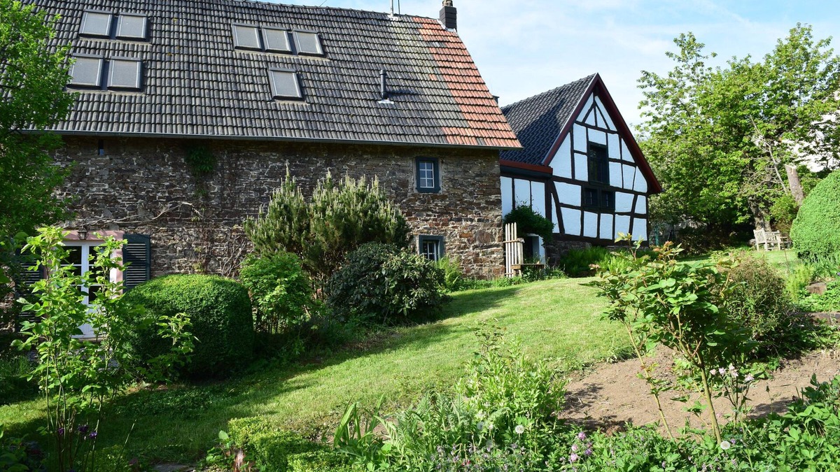 Antweiler Cottage | Historic Eifel country house with beautiful garden, sauna & fireplace