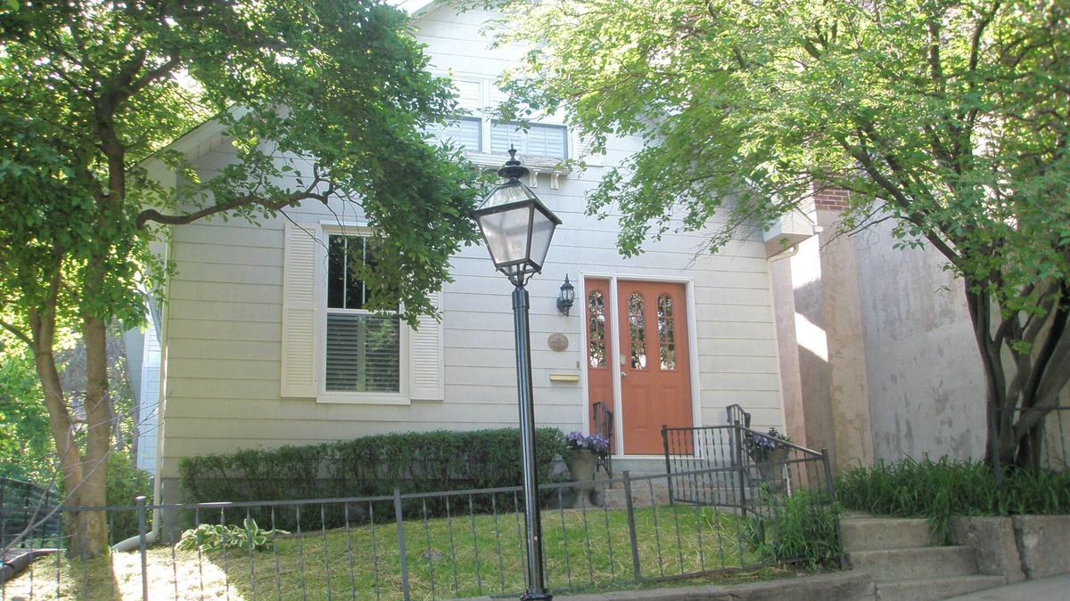Burlington House | Historic home ideally located on famed Snake Alley, a one of a kind location.