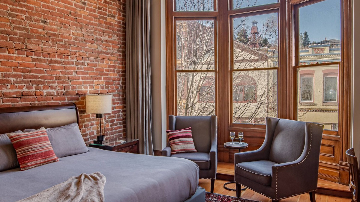 Port Townsend Apartment | Historic Town View Room with bay window overlooking Water Street
