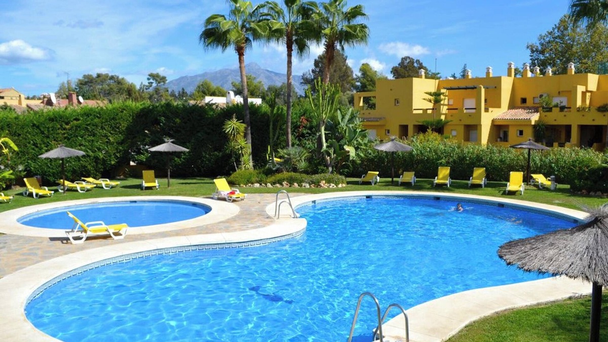 Guadalmina Apartment | Homerez - Elegant Apartment in Marbella, Pool