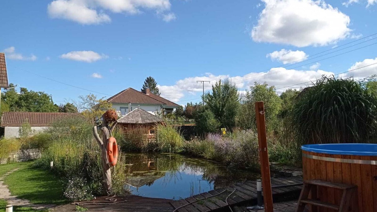 Bad Koenigshofen I. Grabfeld House | Holiday Home 'Haus Wagner with Swimming Pond' with Private Terrace, Shared Garden and Wi-Fi