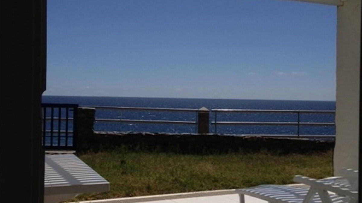 Playa del Aguila House | Holiday Home "Nueva Baviera 42" by the Sea with Garden & Shared Pool